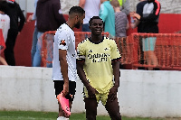 Jordi Osei-Tutu (in yellow) in an interaction with a team mate