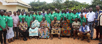 A group photo of the board members and some other stakeholders