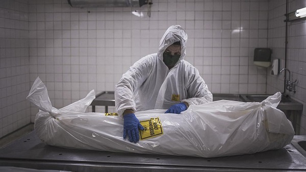 A morgue attendant at the Pretoria branch of the South African funeral and burial services company