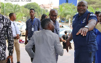 Police in a confrontation with a journalist