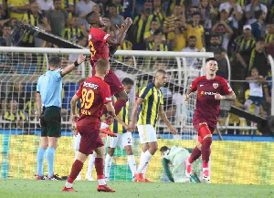 Bernard Mensah celebrating his goal