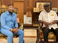 Ex-president John Agyekum Kufour (right) with Dr Samuel Ben Owusu of IAWPA