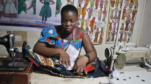 Rachael Mawufemor Agbeviade sewing a dress