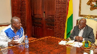 National Chairman of the GPRTU, Kwame Kuma interacts with President Akufo-Addo.