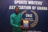 Felix Annan with his award