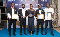 Staff and executives Vodafone Ghana with the awards