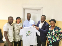 Members of BFC presenting a shirt to former youth and Sports Minister Honorable Dr. Mustapha Ahmed