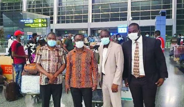 Ghanaians waiting to board their flight at HIA Friday