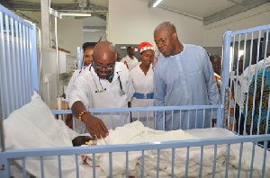 Vice President Amissah-Arthur being taken round the Children