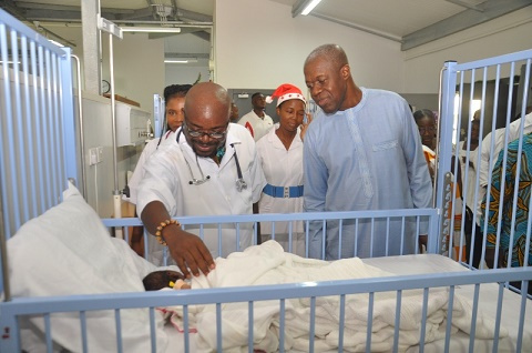 Vice President Amissah-Arthur being taken round the Children