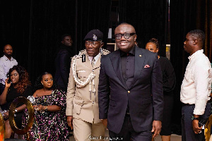 Bola Ray in a pose with the Inspector General of Police Dr George Akuffo Dampare