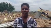 Student in front of the demolished building