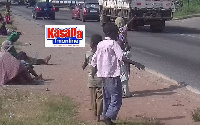 Children begging at Achimota near the old overhead bridge