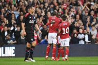 Albert Adomah joined by his teammates after scoring