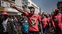 Supporters of the opposition party protest in the streets of Harare, Zimbabwe