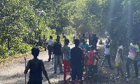 Some community members participating in the clean up exercise