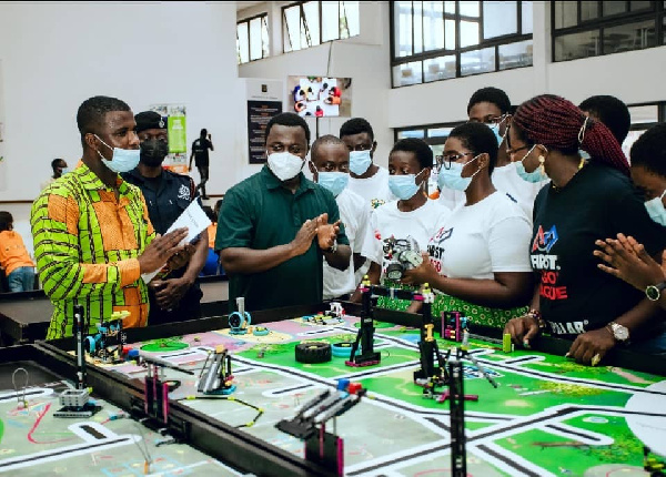 Deputy Education Minister John Ntim Fordjour with some STEM students