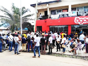 Some Customers Seated On The Chairs