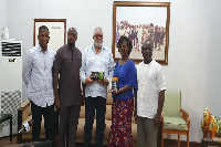 Former President, Jerry John Rawlings with some Rice Value Chain Actors