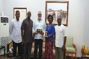 Former President, Jerry John Rawlings with some Rice Value Chain Actors