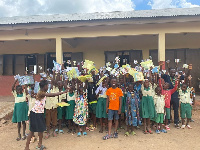 Some pupils of  Siriyiri Basic School show off their reading books