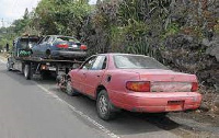 File photo: Abandoned vehicles on a road