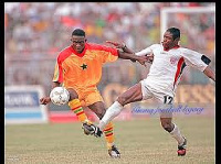 Former Black Stars captain, Emmanuel Osei Kuffour (L)