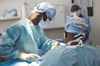 Doctors purforming a surgery