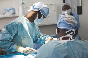 Doctors purforming a surgery