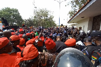 Protesters at the main gate of Parliament