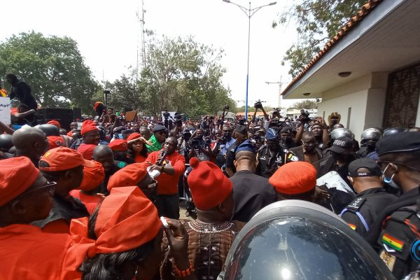 Protesters at the main gate of Parliament