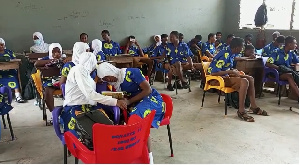 Students of T.I Ahmadiya SHS sitting on plastic chairs