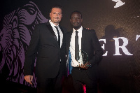 Albert Adomah (right) with his award