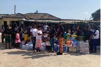 Anijie Global Foundation presenting the items to the caretaker of the orphanage home