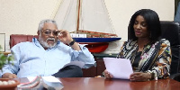 Former President Jerry John Rawlings [L] has lauded Bolton for his latest piece