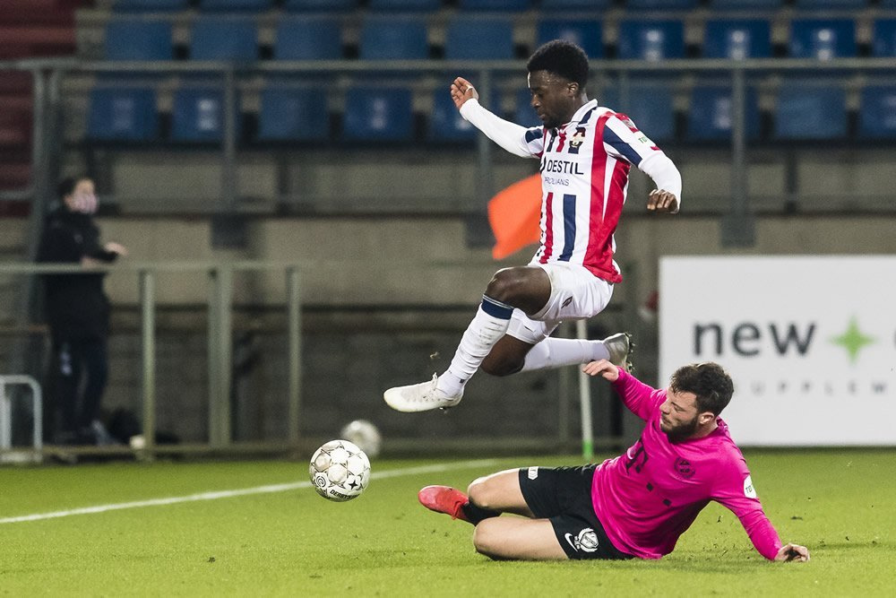 Leeroy Owusu (in white) dribbles past his opponent