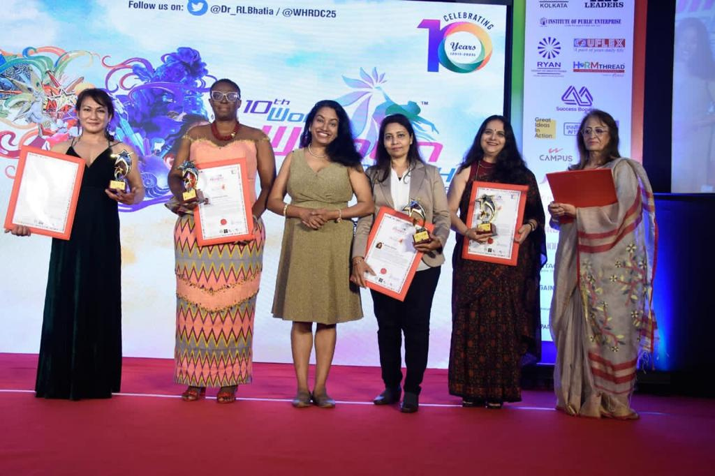 Sophia (second left) with her award citation