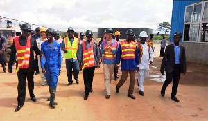 Some Shaanxi officials with a government delegation on the premises of Shaanxi Mining Company Ltd