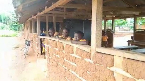 Some of the pupils in the mud structure