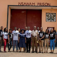 Some RAIN members in a photography with officers at the Nsawam prison