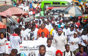 Herbert Mensah with some of the patrons at the walk