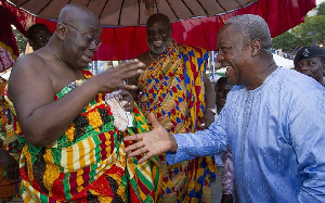 President John Mahama in a handshake with Nana Akufo-Addo