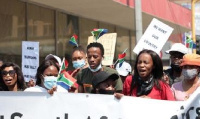 The group protested against human trafficking and undocumented foreign nationals in the country