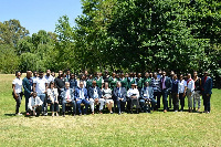 Participant in a group photo after the event