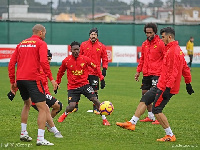 Lumor Agbenyenu with his team mates