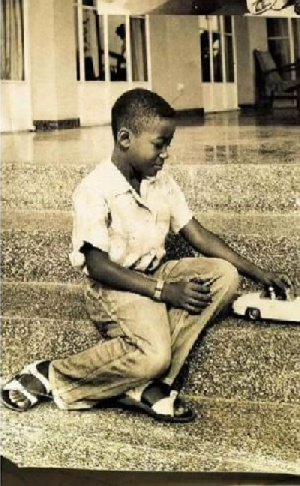 Young Nana Addo Dankwa Akufo-Addo playing with a toy car