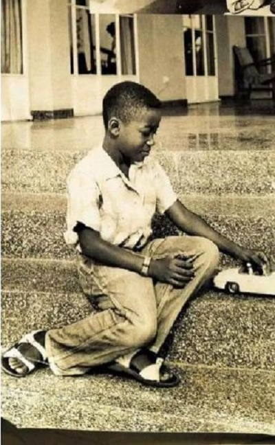 Young Nana Addo Dankwa Akufo-Addo playing with a toy car