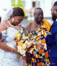 Tracey Boakye with her father and the groom