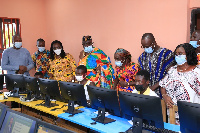 Ursula Owusu-Ekuful with some dignitaries at the newly opened library and ICT centre