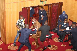 Carlos Kingsley Ahenkorah running away with the ballot papers he snatched